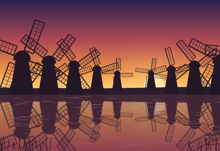 Kinderdijk mill silhouettes reflected in the canal at sunset